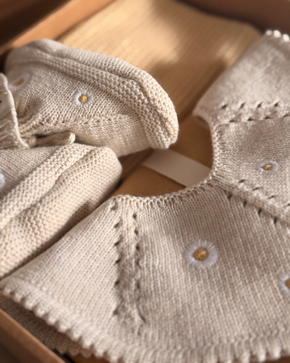 Knitted bib - Petite Daisy