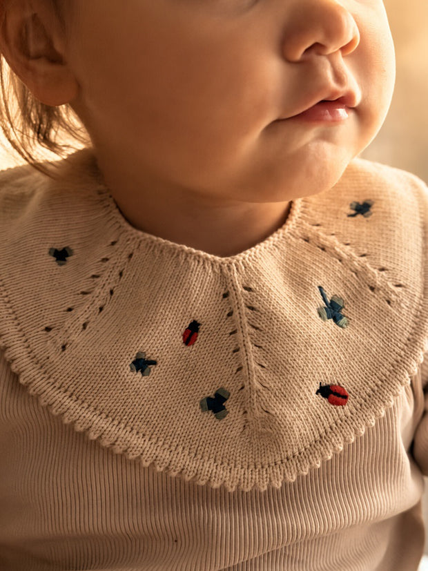 Knitted bib  - Ladybug Garden